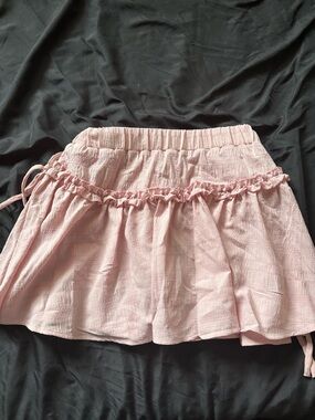 Women’s Pink Ruffle Mini Skirt with build in shorts I have never worn before.